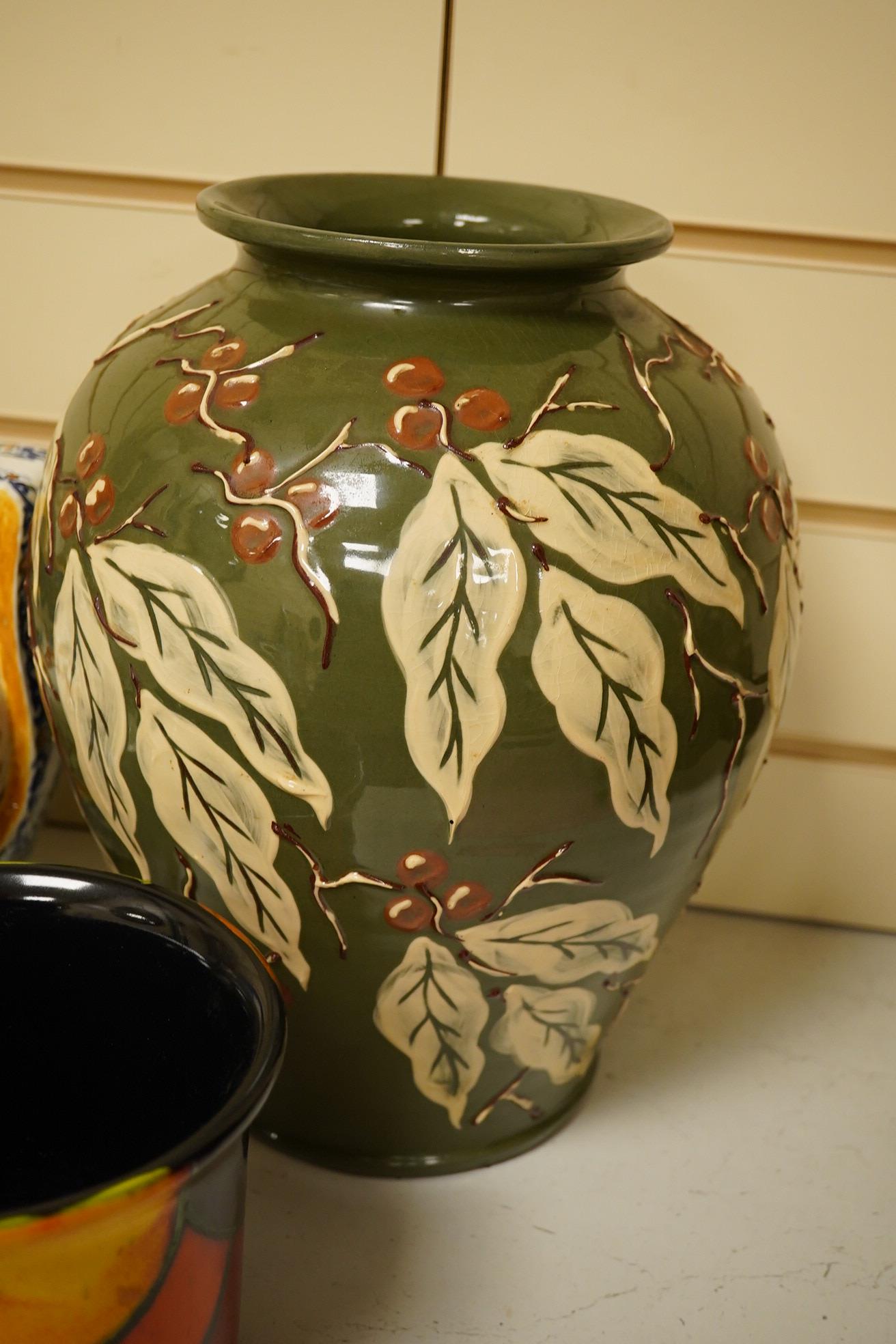 A Brannam pottery vase, Gien two-handled jardiniere and Poole pottery and four items of Cornish ware. Brannam vase 31cm high. Condition - some crazing to jug Gien jardiniere has internal glazing cracks